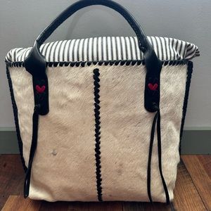 Cowhide and leather bag.